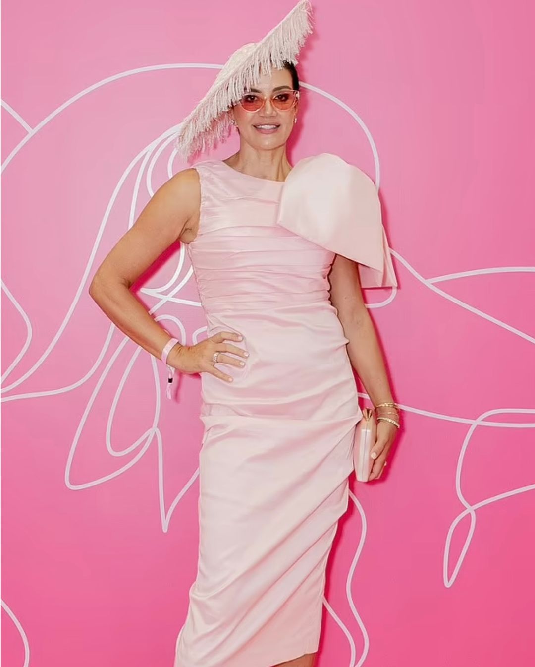 krissy marsh wearing our vegan feather headpiece