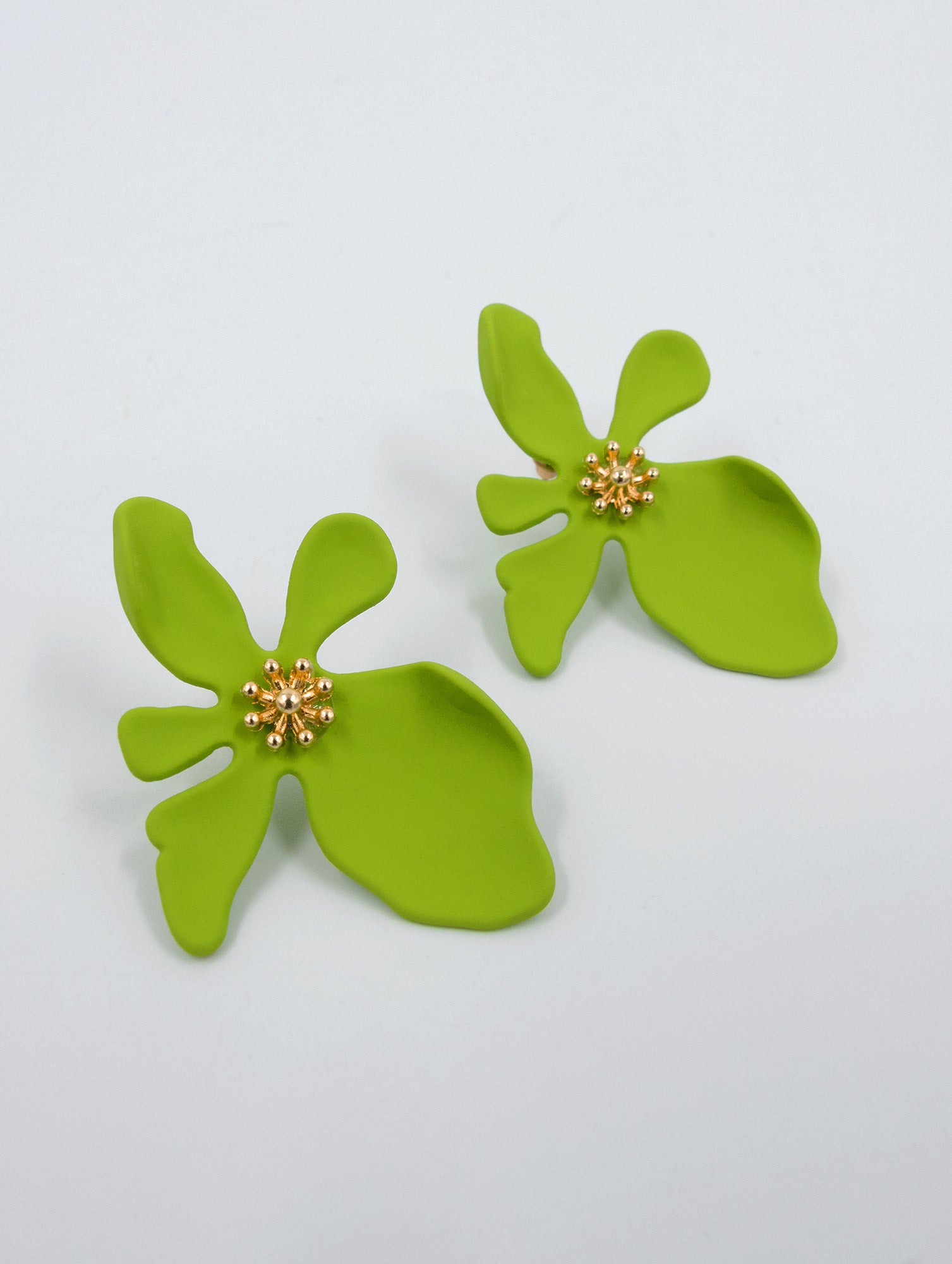 lime-coloured, abstract-shaped flower earrings with gold centre that look like stamen